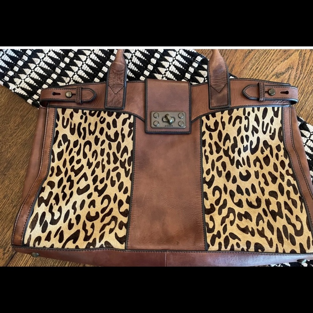 Fossil cheetah leather purse